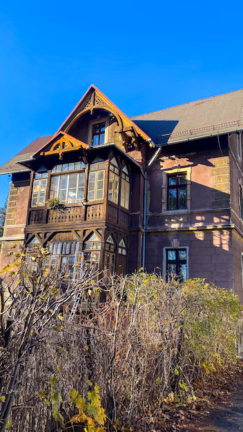 large brown house with brown roof windows 1025556 120851 1