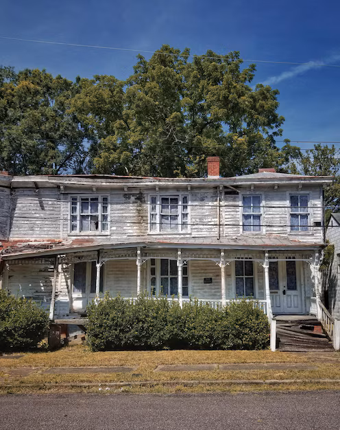 built structure by trees buildings against sky 1048944 272724